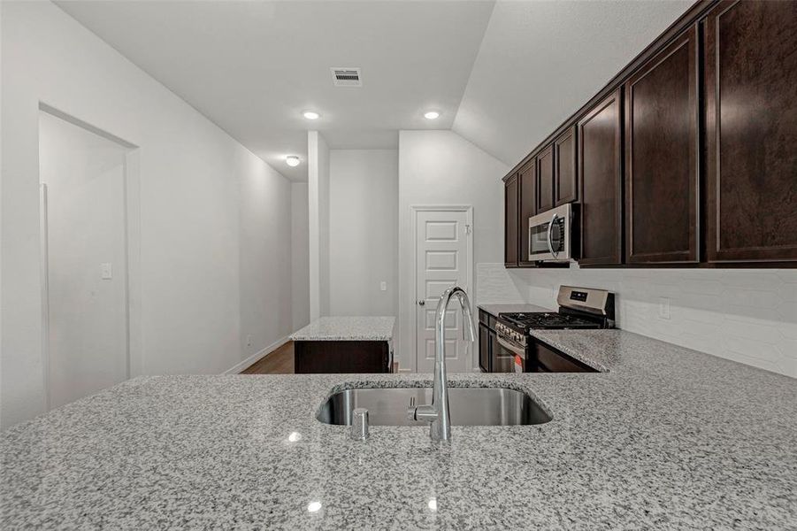 Furnished interior view inside a new home in Marvida, Cypress (Image 6).