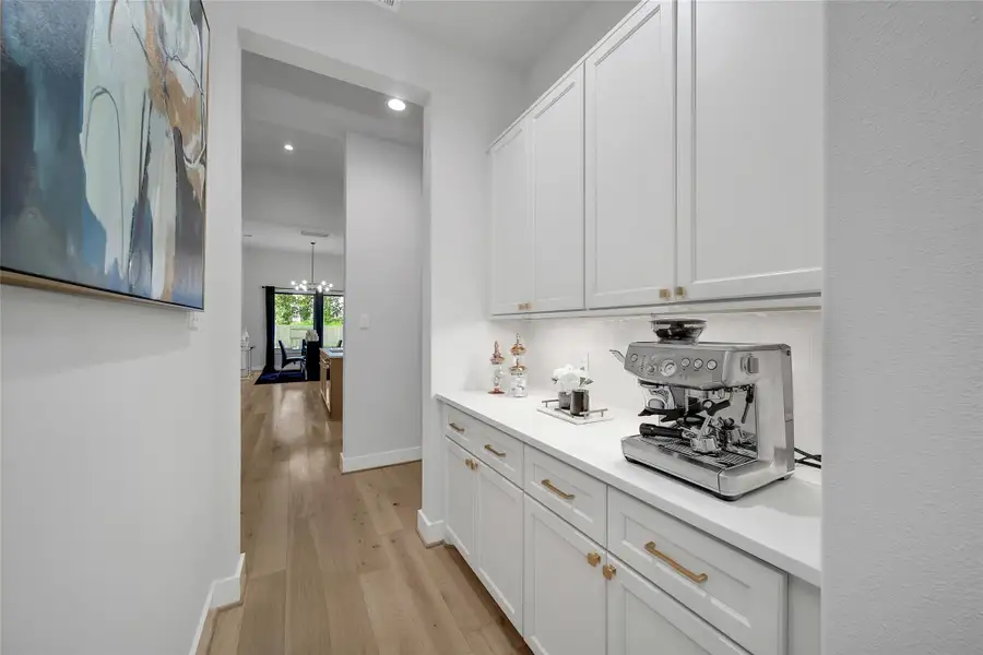 Furnished interior view inside a new home in ARTAVIA, Conroe (Image 33).