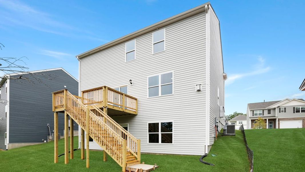 Exterior details and patio area of a home in Spring Ridge, Anderson (Image 20).