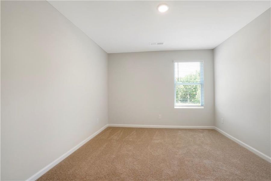 Spacious, unfurnished interior of a new home in Fern Dale, Fairburn (Image 25).