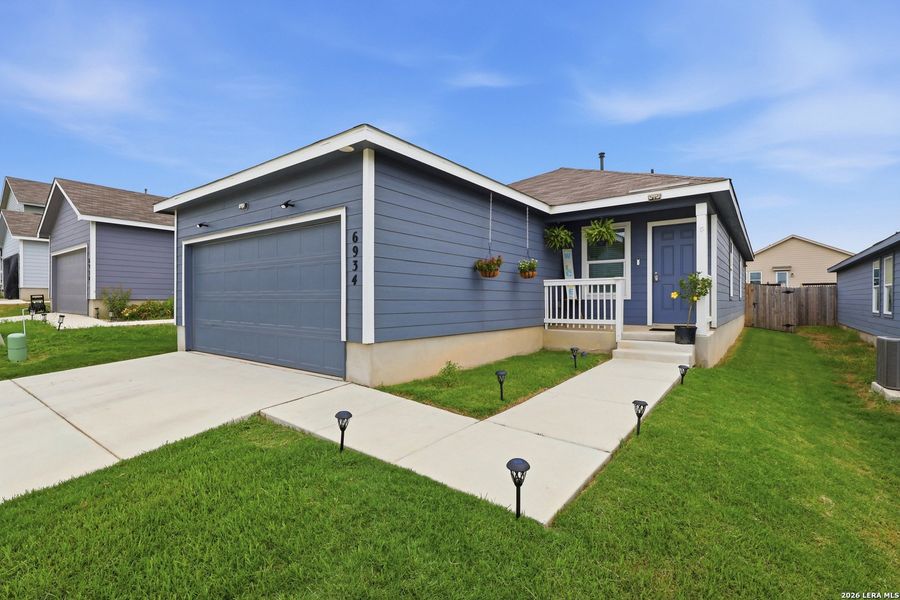 Front exterior of a new home in Crescent Hills, San Antonio, TX, highlighting curb appeal (Image 23). Front exterior of a new home in Crescent Hills, San Antonio, TX, highlighting curb appeal (Image 23).