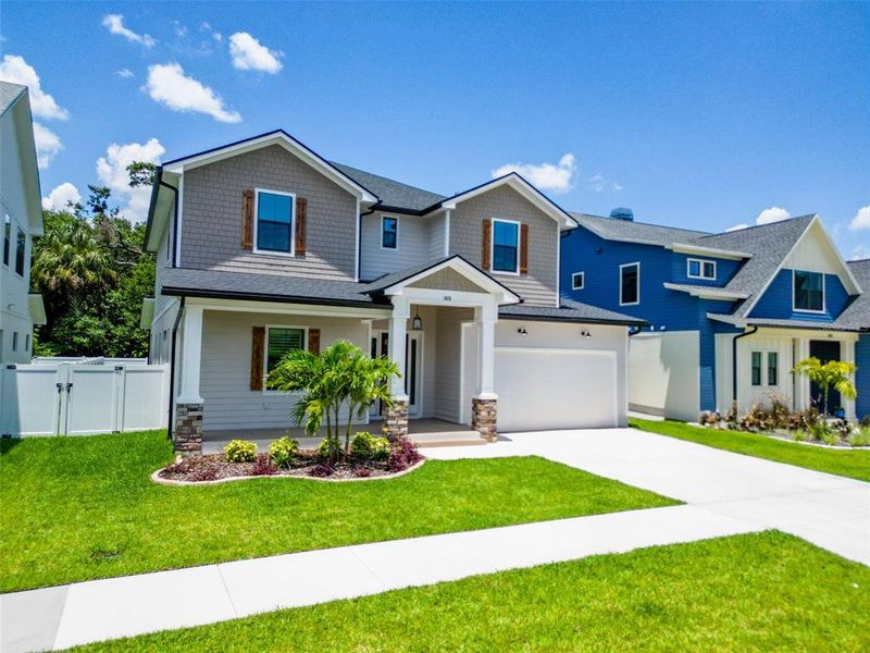 Front exterior of a new home in , Tampa, FL, highlighting curb appeal (Image 2).