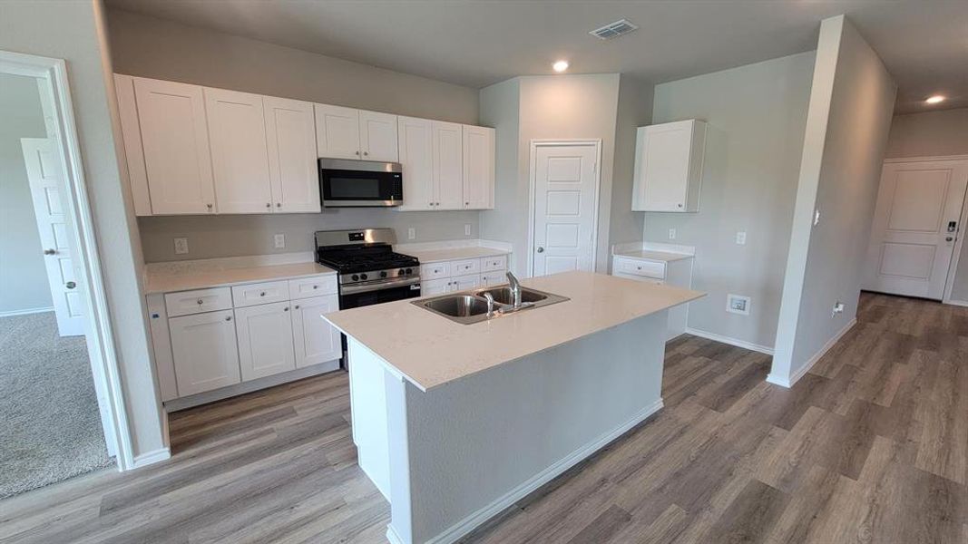 Kitchen - All Home and community information, including pricing, included features, terms, availability and amenities, are subject to change at any time without notice or obligation. All Drawings, pictures, photographs, video, square footages, floor plans, elevations, features, colors and sizes are approximate for illustration purposes only and will vary from the homes as built.