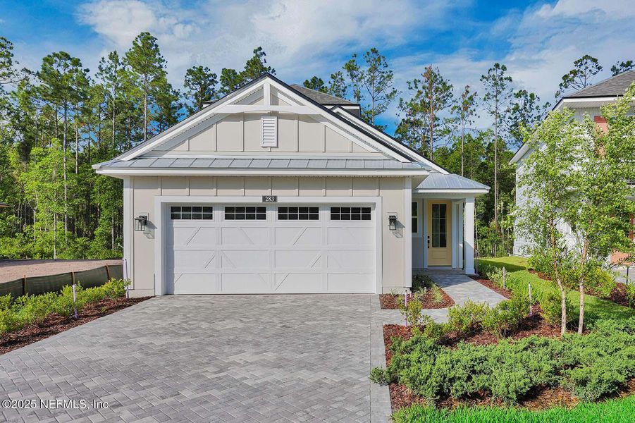 Front exterior of a new home in Reflections at Nocatee, Ponte Vedra, FL, highlighting curb appeal (Image 1). Front exterior of a new home in Reflections at Nocatee, Ponte Vedra, FL, highlighting curb appeal (Image 1).