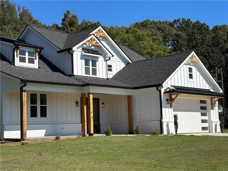 Front exterior of a new home in , Maysville, GA, highlighting curb appeal (Image 20).