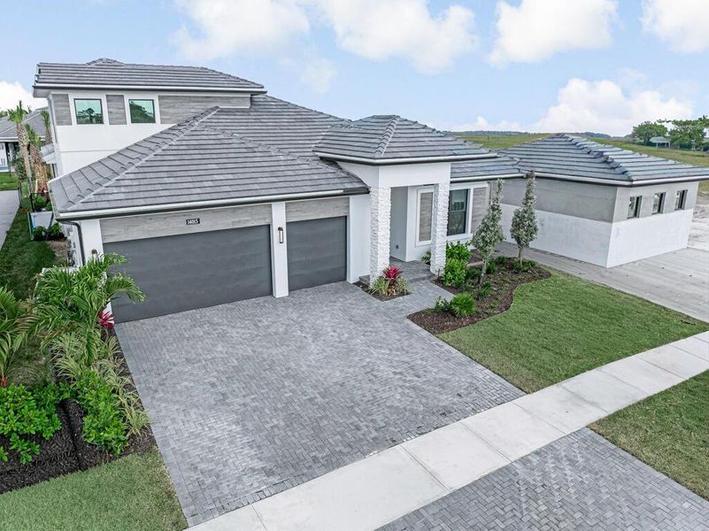 Exterior details and patio area of a home in Esprit at Avenir, Palm Beach Gardens (Image 33). Exterior details and patio area of a home in Esprit at Avenir, Palm Beach Gardens (Image 33).