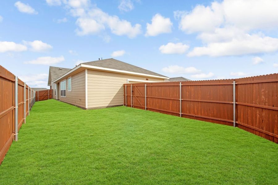 Representative exterior photo of a completed home built from the Wesley by Impression Homes in Heartland, Heartland, TX (Image 23). Representative exterior photo of a completed home built from the Wesley by Impression Homes in Heartland, Heartland, TX (Image 23).