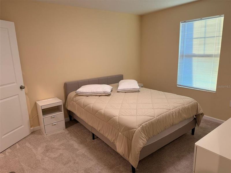 Furnished interior view inside a new home in Waterbrooke, Clermont (Image 9).