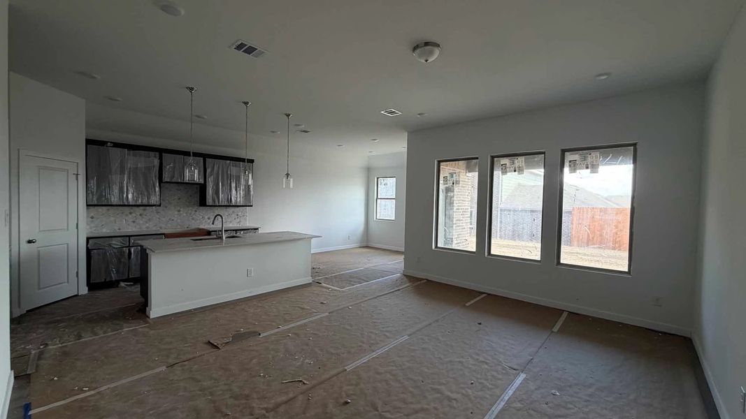 Open Kitchen-Living-Dining Room Construction Progress featuring the Roosevelt Collection