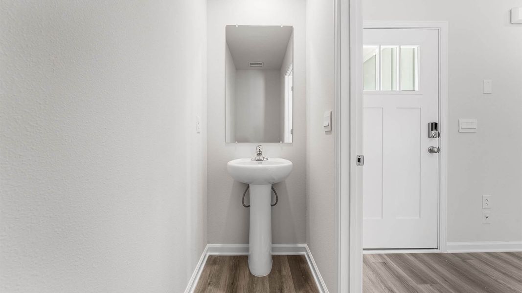 Representative furnished interior of a home built from the The Aisle by D.R. Horton in Chateau Nemours, Port Saint Joe (Image 12).