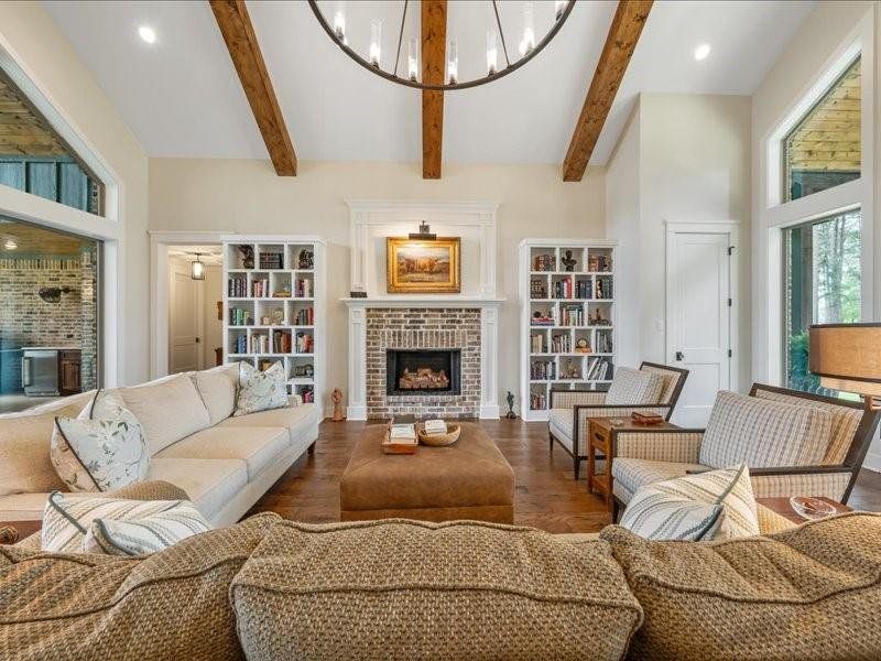 Vaulted ceiling with ventless fireplace.  Rustic with a touch of modern is reflected throughout the home.