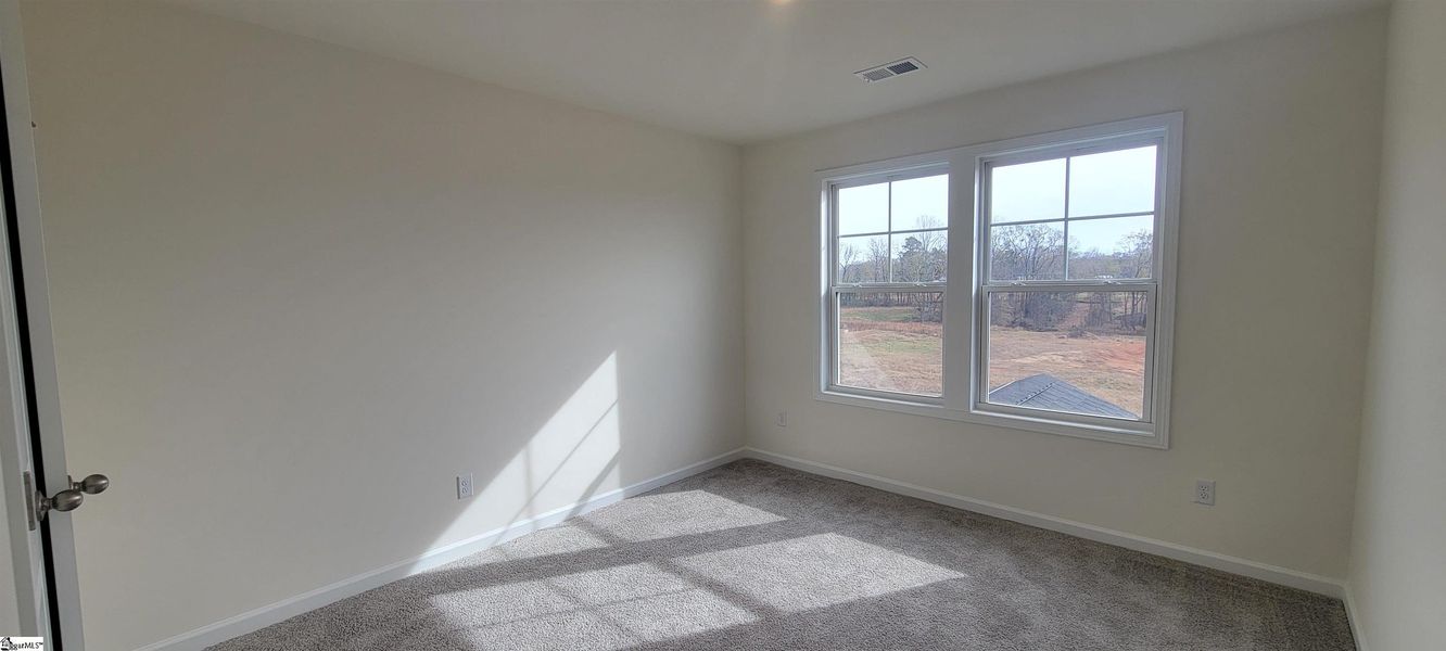 Spacious, unfurnished interior of a new home in Halton Oaks, Spartanburg (Image 18).