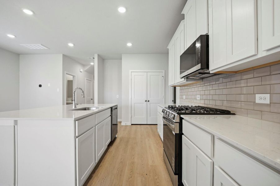 Furnished interior view inside a new home in Barrett Crossing, Crosby (Image 12).