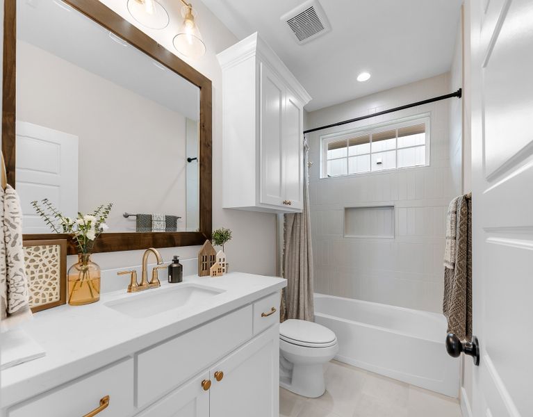 Representative furnished interior of a home built from the The Courtney by Reece Homes in Traditions, Bryan (Image 24).