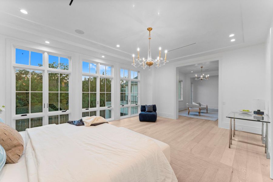 The primary suite offers serene backyard views and private access to the master terrace. The primary suite offers serene backyard views and private access to the master terrace.