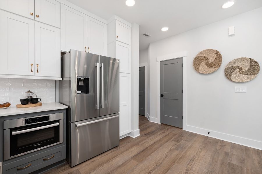 Representative furnished interior of a home built from the Harrington by Baker Residential in Parc at Bradley Farm, Apex (Image 7).