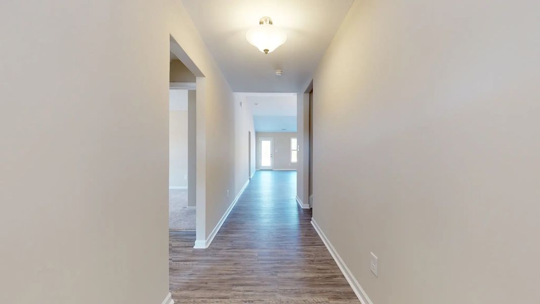 Representative unfurnished interior of a home built from the Corbin A by JC Jackson Homes,LLC in Heritage Pointe, Newport (Image 20).