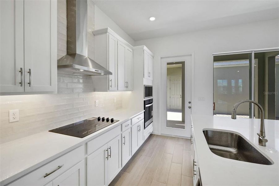 Furnished interior view inside a new home in Serenade at Ovation, Winter Garden (Image 9).