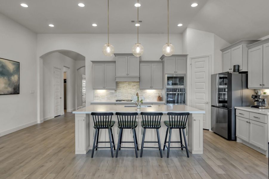 Kitchen lighting is thoughtfully layered with recessed, pendant, and under-cabinet fixtures for both function and ambiance. Kitchen lighting is thoughtfully layered with recessed, pendant, and under-cabinet fixtures for both function and ambiance.