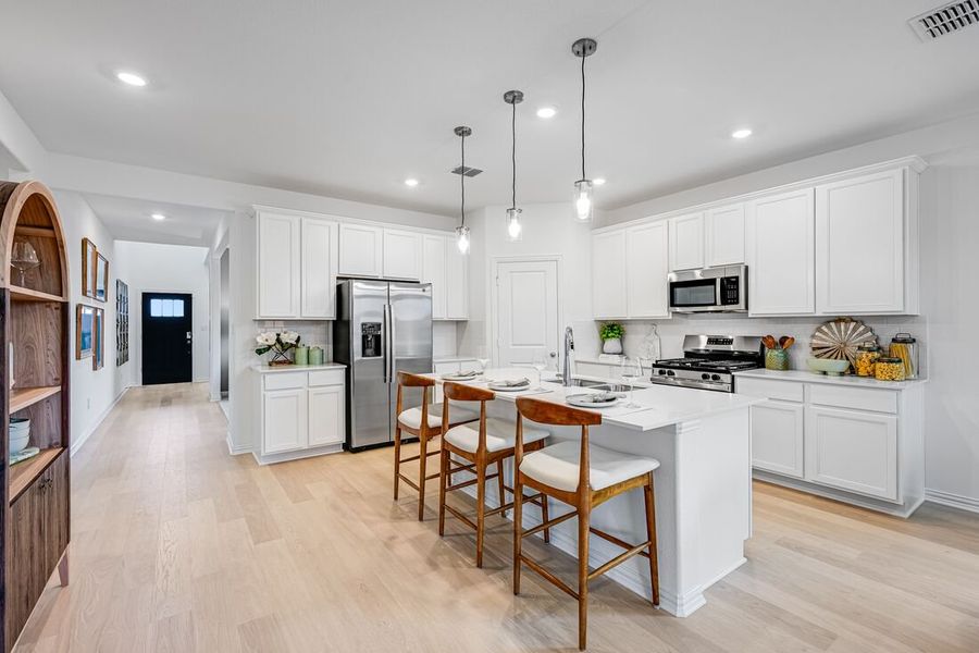 Representative furnished interior of a home built from the Georgetown by Taylor Morrison in Parks at Foster Crossing, Anna (Image 6).