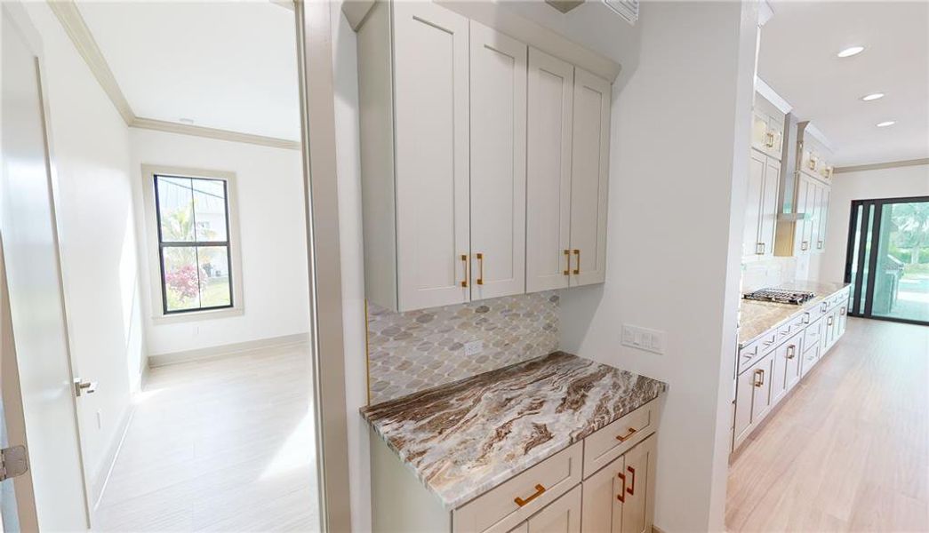 Garage foyer, laundry room and ensuite guest room
