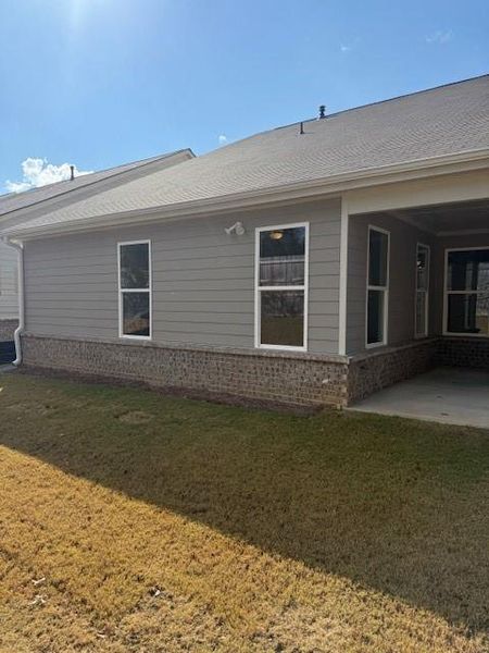 Exterior details and patio area of a home in Cooper's Walk, Loganville (Image 14).