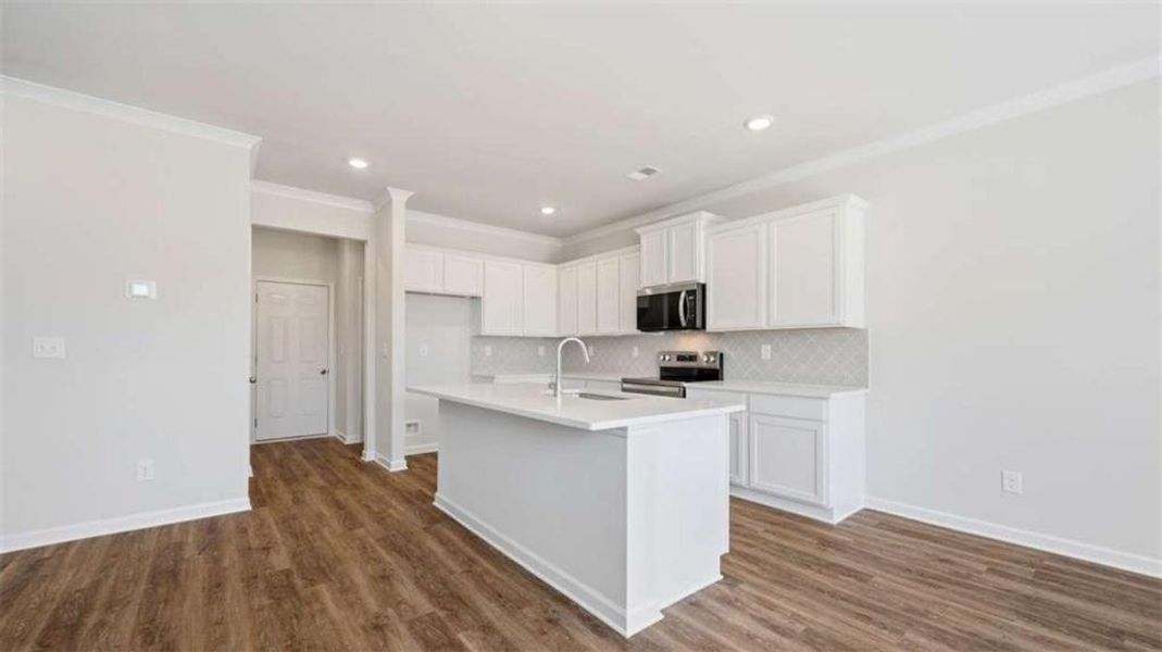 Furnished interior view inside a new home in Inverness at Sugarloaf, Lawrenceville (Image 4).