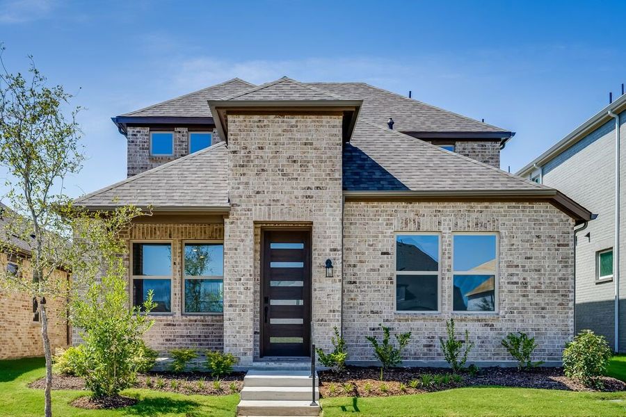 Representative exterior photo of a completed home built from the Tartini by Taylor Morrison in Cross Creek Meadows 40s, Celina, TX (Image 2). Representative exterior photo of a completed home built from the Tartini by Taylor Morrison in Cross Creek Meadows 40s, Celina, TX (Image 2).
