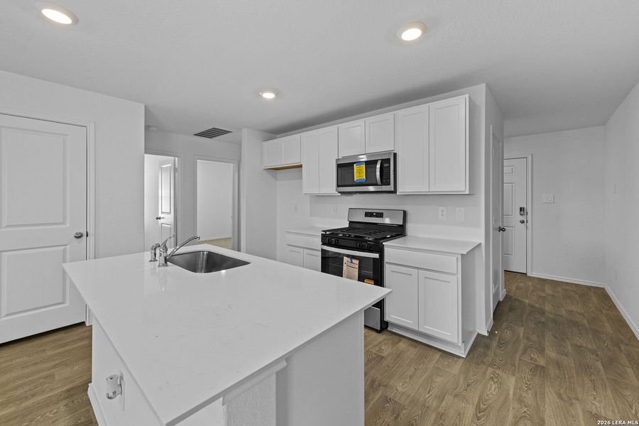Furnished interior view inside a new home in Hickory Ridge, Elmendorf (Image 7).