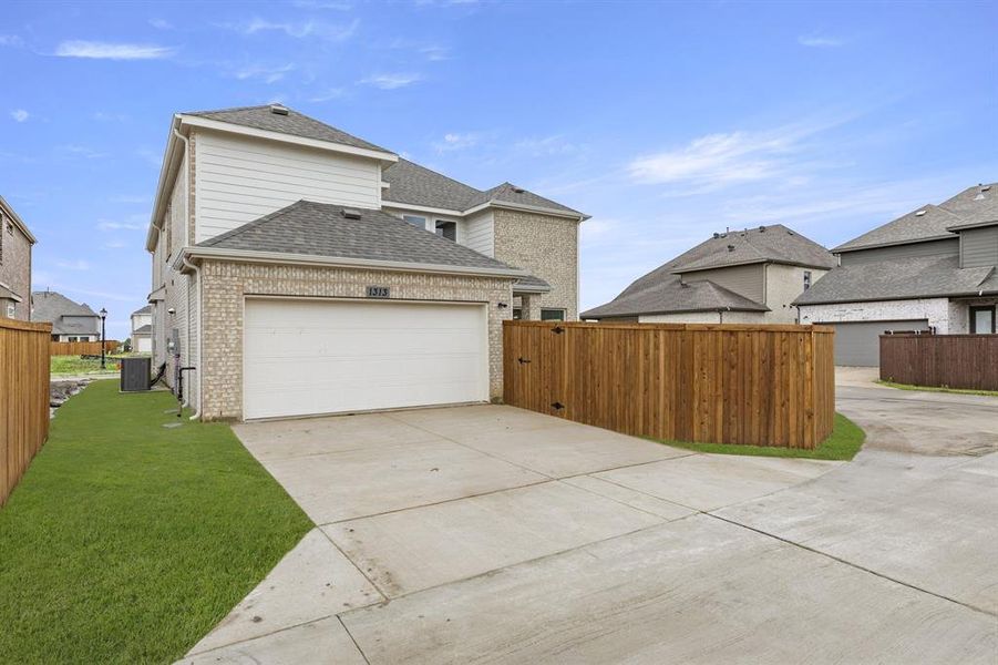 Exterior details and patio area of a home in Villages of Creekwood, Frisco (Image 4). Exterior details and patio area of a home in Villages of Creekwood, Frisco (Image 4).