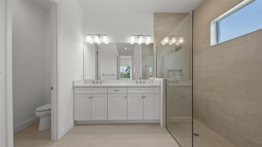 Furnished interior view inside a new home in Verandah, Fort Myers (Image 8). Furnished interior view inside a new home in Verandah, Fort Myers (Image 8).