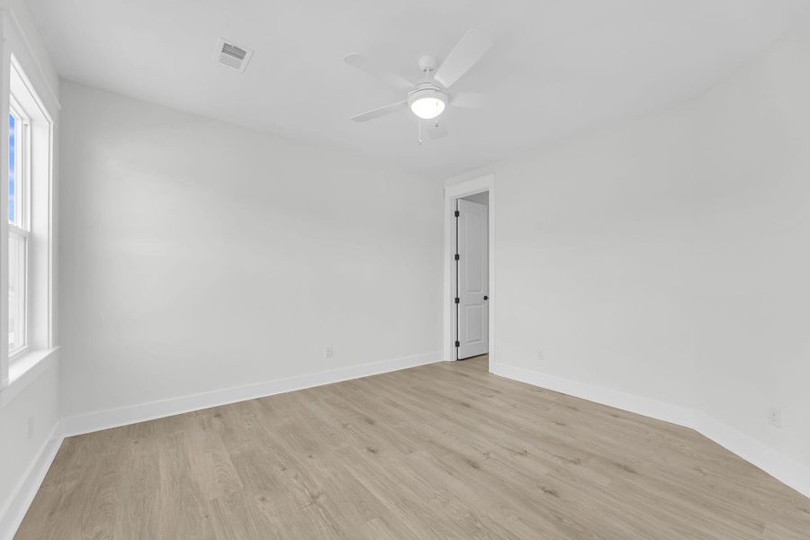 Spacious, unfurnished interior of a new home in Miller's Crossing, Johns Island (Image 18). Spacious, unfurnished interior of a new home in Miller's Crossing, Johns Island (Image 18).