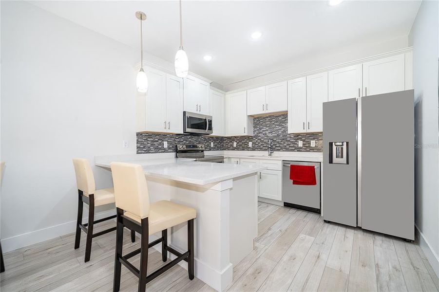 Furnished interior view inside a new home in , Kissimmee (Image 7).