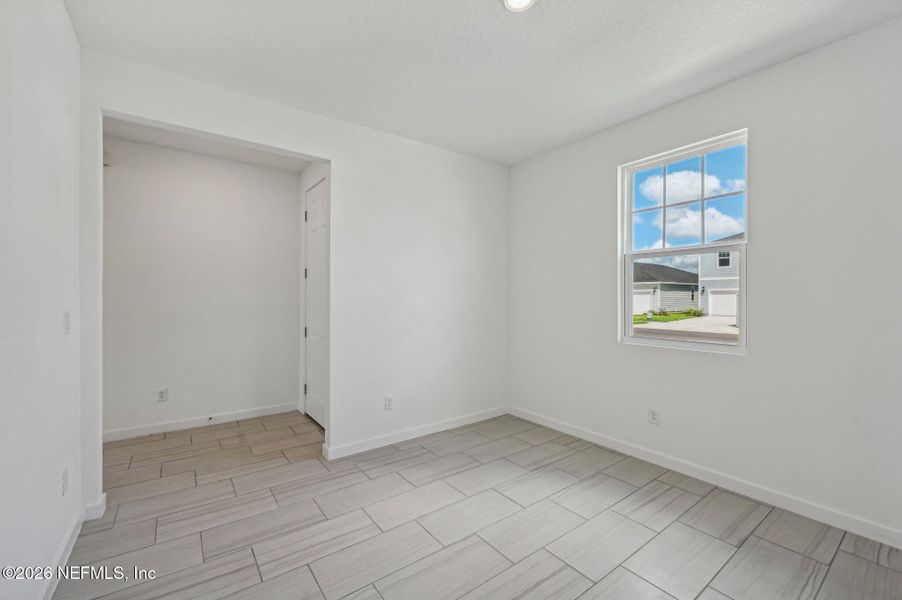 Spacious, unfurnished interior of a new home in Lakes at Bella Lago - Signature Series, Green Cove Springs (Image 33).