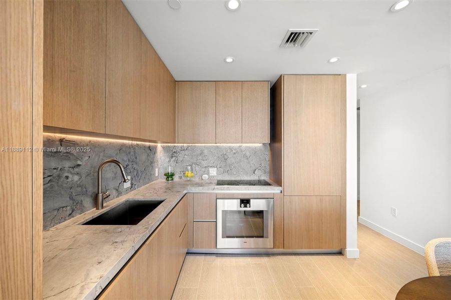 Furnished interior view inside a new home in , Miami Beach (Image 9).