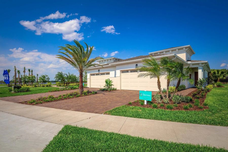 Representative exterior photo of a completed home built from the Daytona by Jones Homes USA in Twin Lakes, St. Cloud, FL (Image 8).