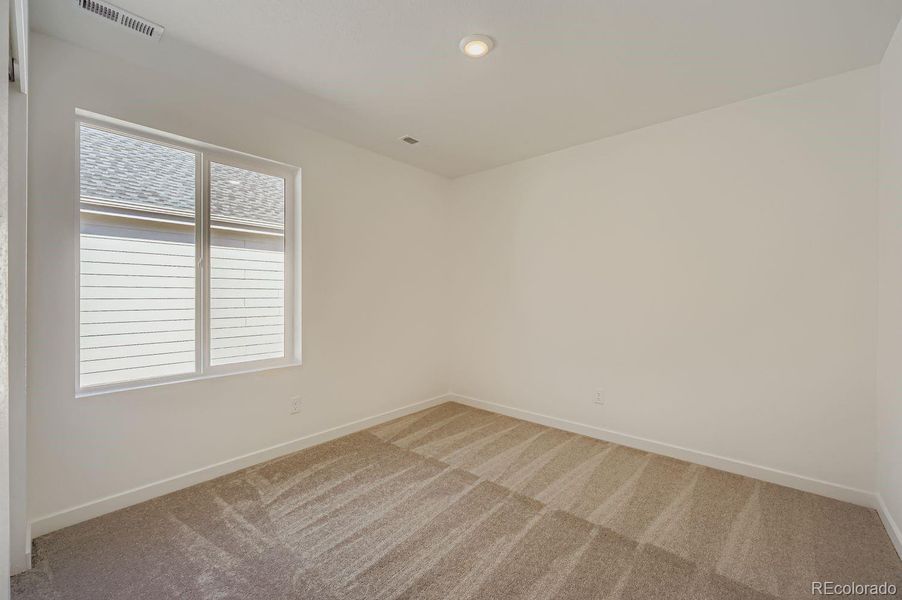 Spacious, unfurnished interior of a new home in Percheron: The Explorer Collection, Colorado Springs (Image 11).