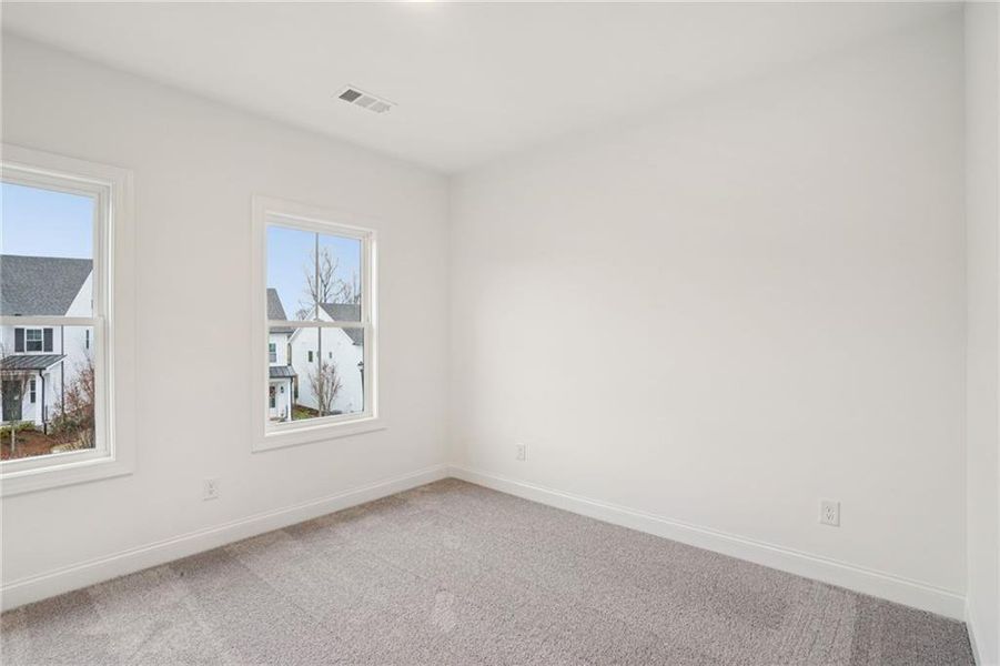 Spacious, unfurnished interior of a new home in Palisades Townhomes, Cumming (Image 27).