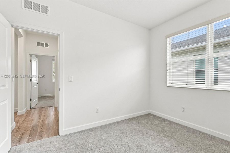 Spacious, unfurnished interior of a new home in Tradition, Port St. Lucie (Image 27).