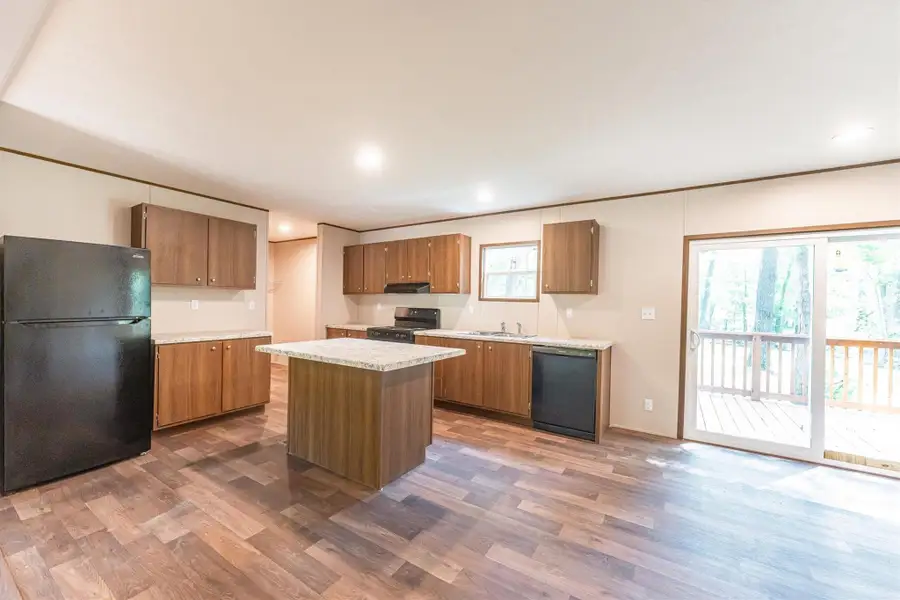 Furnished interior view inside a new home in , Conroe (Image 4).
