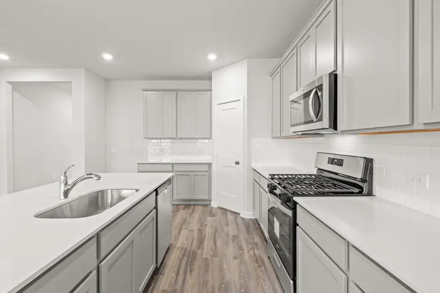 Furnished interior view inside a new home in Liberty Collection at Paloma at Sanford Farms, Waller (Image 7).