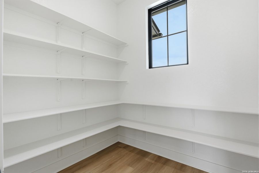 Spacious, unfurnished interior of a new home in Enchanted Bluff, San Antonio (Image 31).
