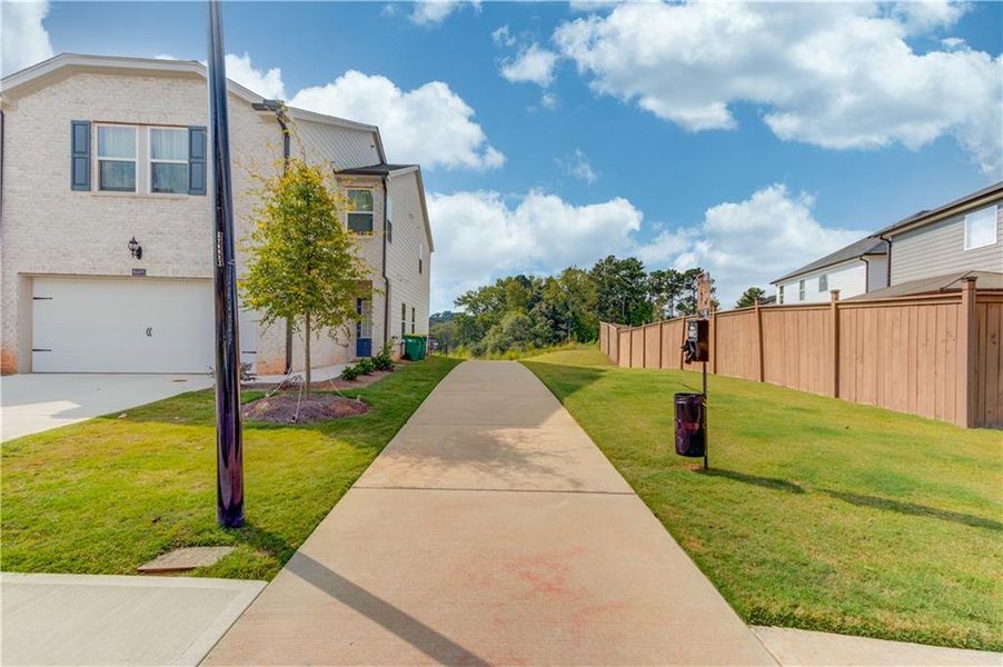 Front exterior of a new home in Sweetwater Green - Royal Series, Lawrenceville, GA, highlighting curb appeal (Image 18).