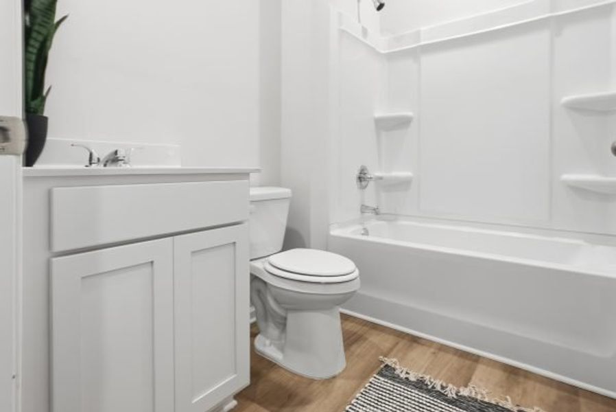 Representative furnished interior of a home built from the Orchard by Piedmont Residential in Villages at Cedar Hill, Dallas (Image 11).