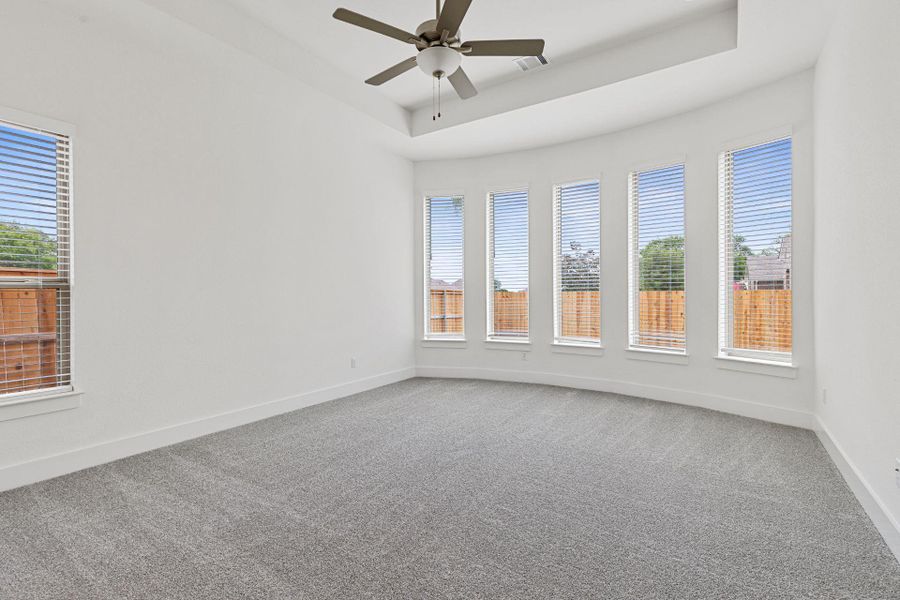 Primary Bedroom with bay windows Primary Bedroom with bay windows