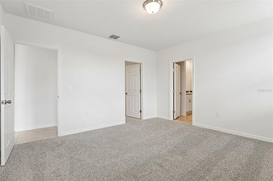 Spacious, unfurnished interior of a new home in Lawson Dunes - Signature Series, Haines City (Image 33).