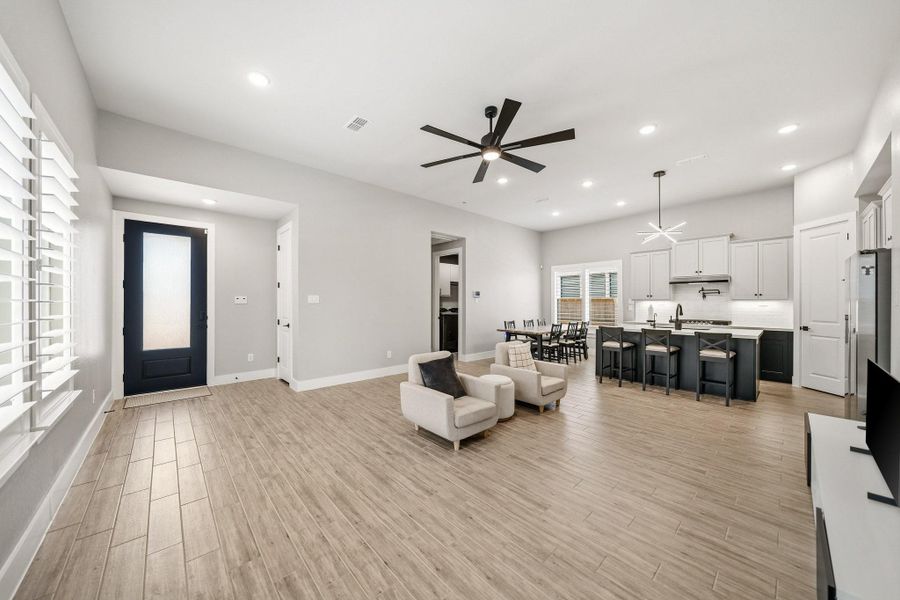 Furnished interior view inside a new home in Meridiana 40', 65', Iowa Colony (Image 9).