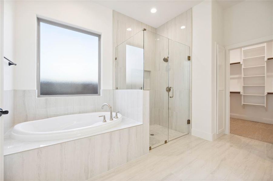 Bathroom with shower with separate bathtub