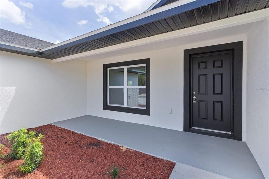 Exterior details and patio area of a home in , Ocklawaha (Image 22).