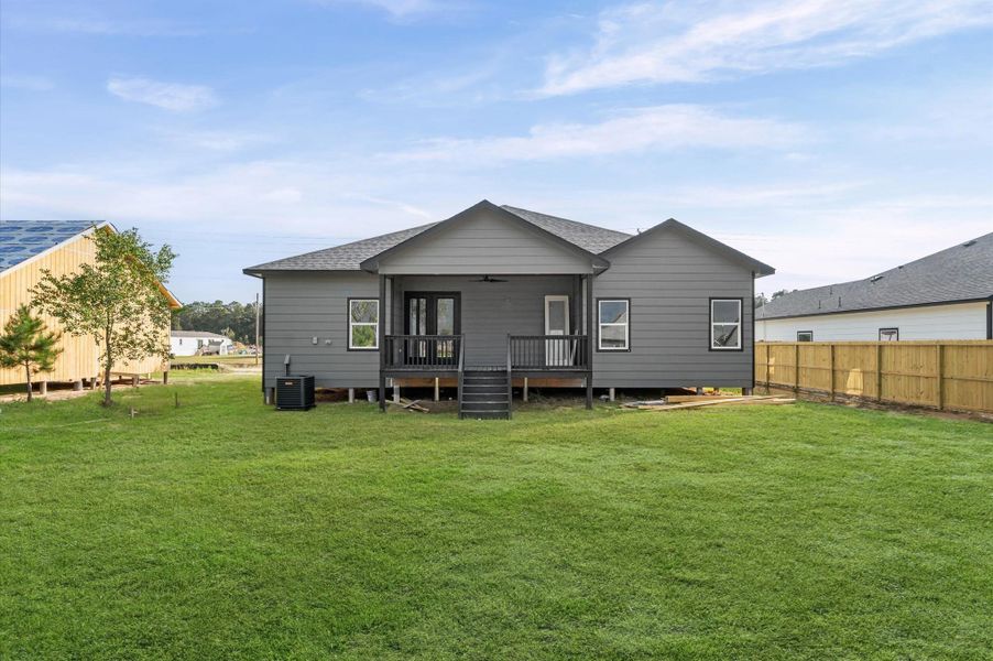 Exterior details and patio area of a home in , Huffman (Image 25).